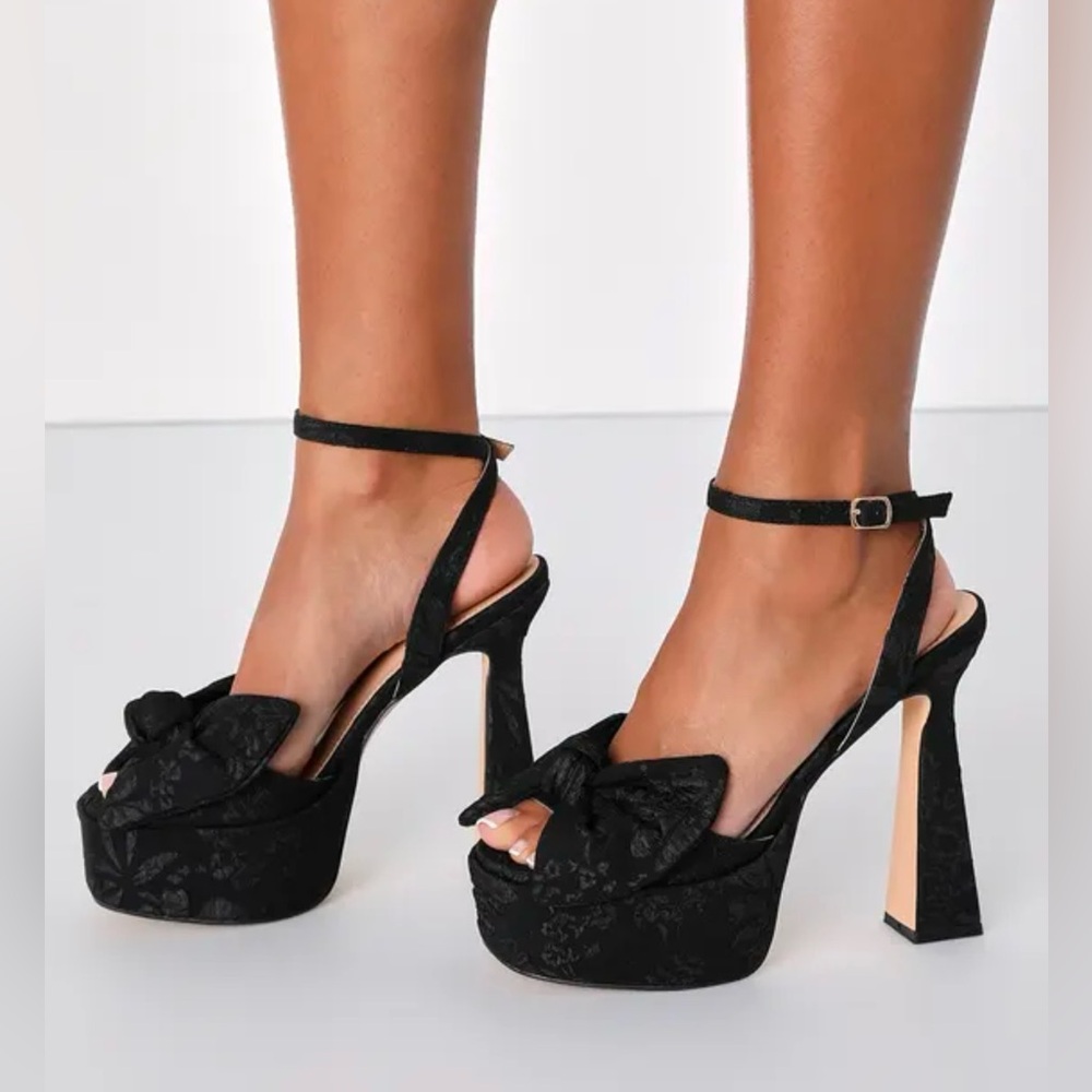 Black Platform Heels with Ankle Strap and Decorative Bow
